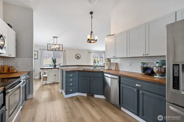 Spacious kitchen with vaulted ceilings & pantry