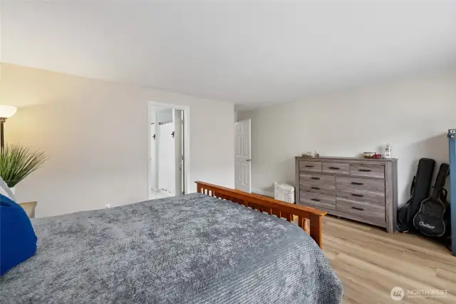 Large primary bedroom with attached 5 piece bathroom & walk-in closet