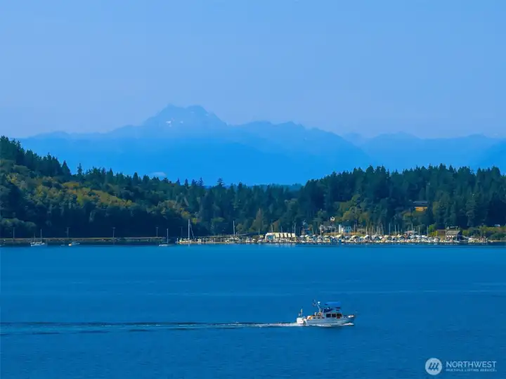 The Olympics are usually front and center and are often snow capped. When the haze burns off they are glorious!