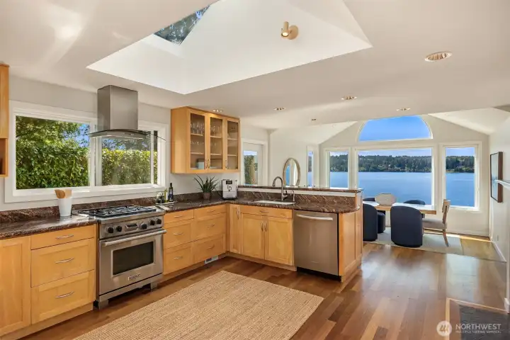 Chefs kitchen with Wolf range ample room to move about and have friends over to help with the cooking!