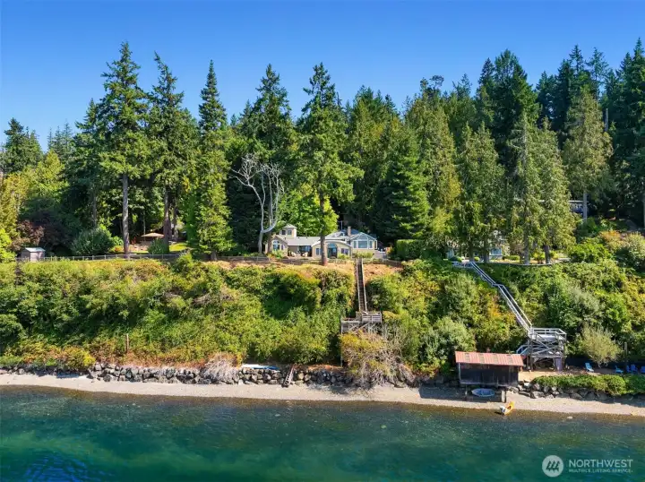 Take a closer look, this property is totally private. From the home you can not see either neighbor, nor can they see you!
