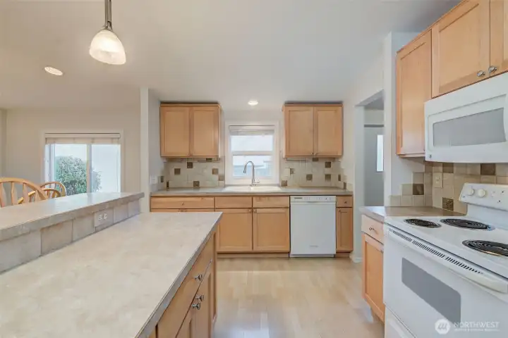 Nice countertops with tiled backsplash.