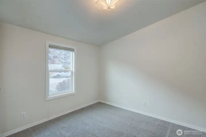 Bedroom #2 with new carpet.