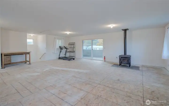 Sliding glass doors to the covered view deck off the bonus room.