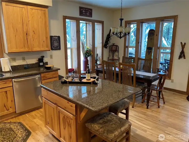 Full kitchen with hickory cabinets, stainless appliances and granite counters. Hickory cabinets add to the cabin feel.