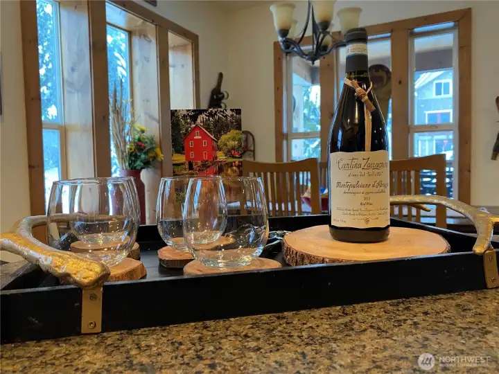 Luxury at its best! Complimentary wine and a card for incoming guests.