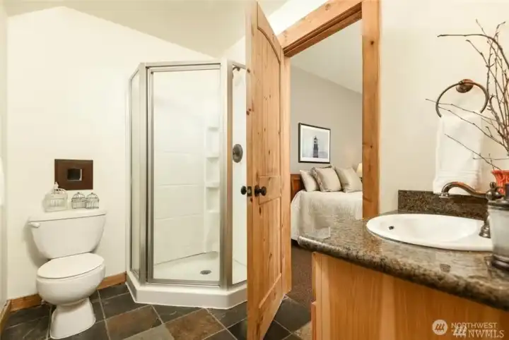 Shower and bathroom off of the garage level guest bedroom.