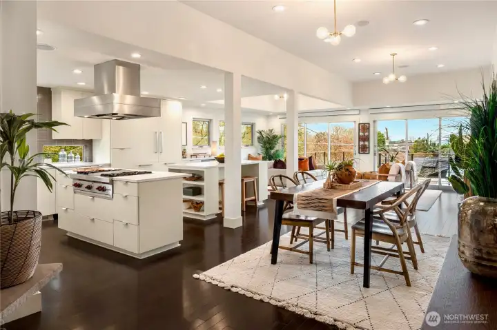 Open-concept living at its best, with a spacious dining area flowing effortlessly into the chef’s kitchen and light-filled living spaces.