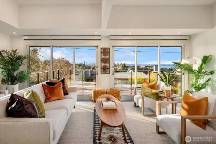 A warm, welcoming living room with clean lines and abundant natural light, ideal for relaxing or hosting guests.