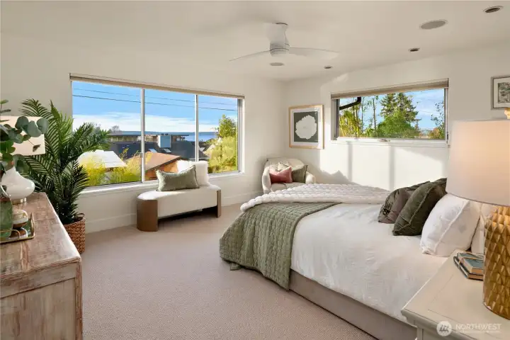 Serene primary bedroom retreat with soft natural light and a calm, inviting atmosphere.