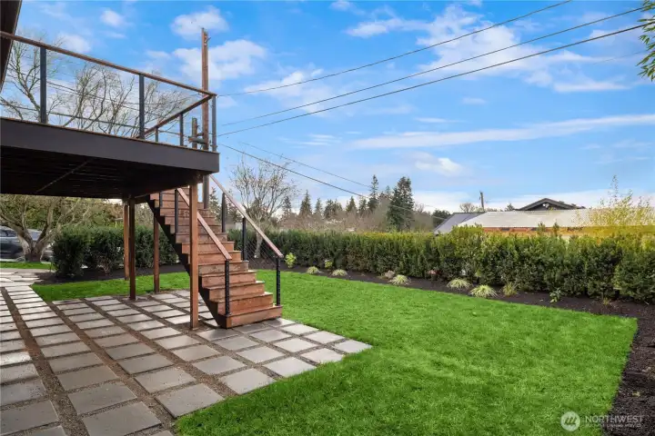 A level, private backyard ideal for entertaining, play, or quiet evenings under the open sky.