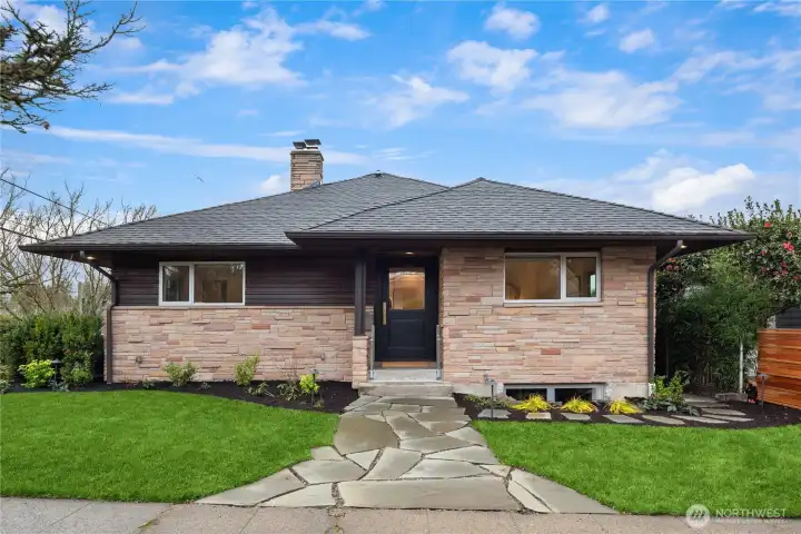 Timeless curb appeal with clean architectural lines, warm brick accents, and a welcoming entry...you will love it here!