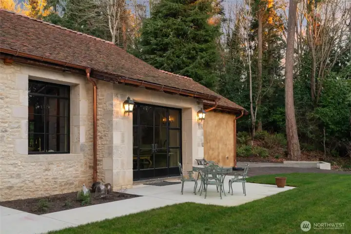 Antique French clay roof tiles installed for enduring beauty and longevity.