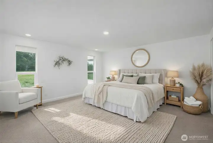 Your primary suite! An abundance of space for a king sized bed and furnishings. Your suite is flooded with natural light from 2 floor to ceiling windows. Abundance of closet space with 2 walk in closets and separate linen closet. Direct access to your beautifully remodeled and private en suite bathroom with access to your own private covered patio. Photo is virtually staged.