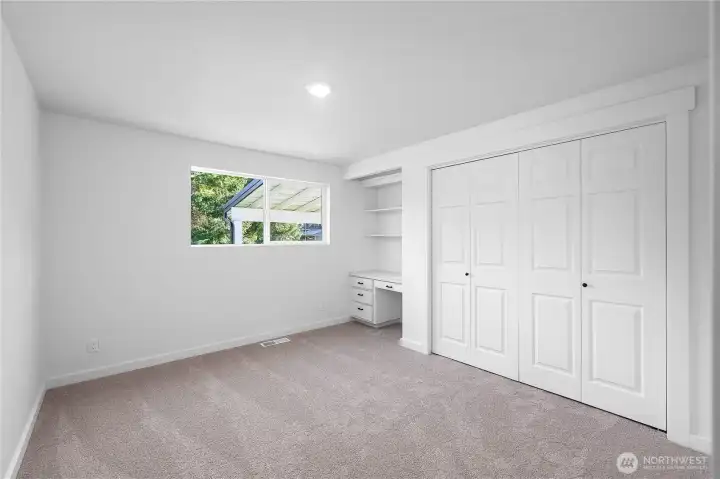 Fantastic sized second bedroom with views to the fenced backyard. Recessed lighting and new carpeting throughout. Ready for your vision.