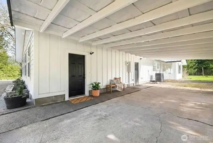 ADU Entrance! Covered multi car carport provides access to ADU. Separate entry from main home allows privacy, multi family living potential, rental opportunities, business opportunity, etc.