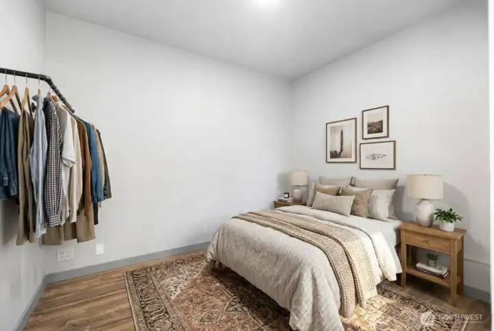 Fantastic sized additional room in ADU of entryway! This space fits a queen sized bed wonderfully with additional room for night stands. Photo is virtually staged.