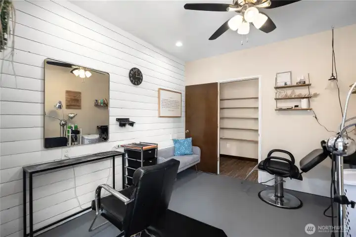 Alternate view of additional room currently used as a hair salon. Large space with electricity and plumbing in place. A true flex space.