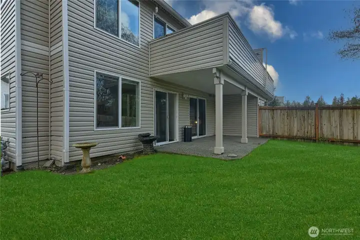 Covered porch off living room and primary bedroom. Corner lot is secluded no neighbor to the south.