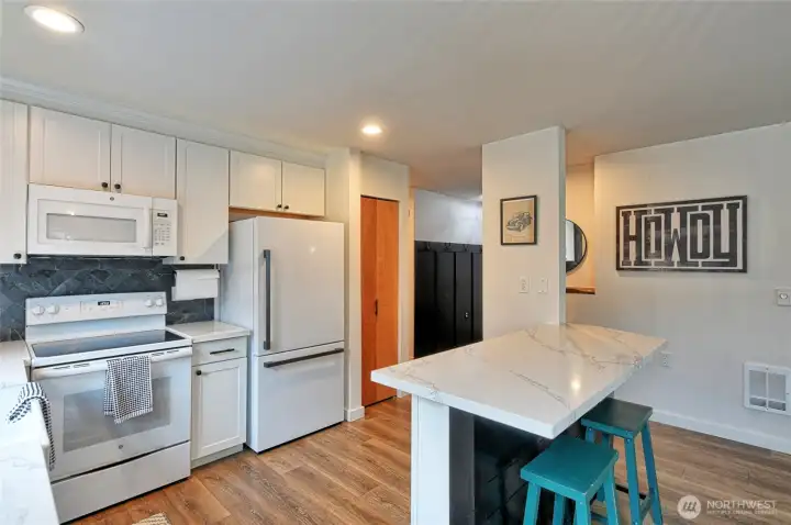 Looking back through kitchen, nice appliance all stays with the home