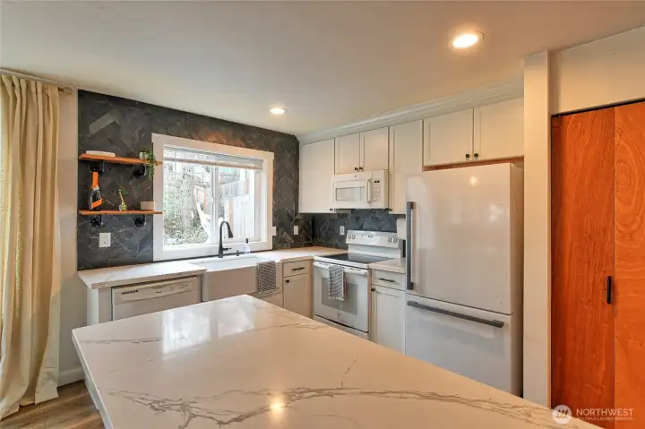Another look into the kitchen nice quartz counter tops