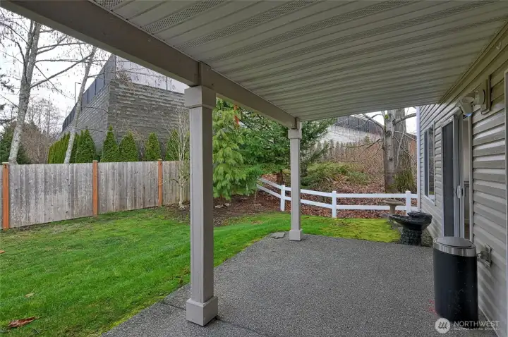 Covered porch of Primary Bedroom and Living room. Nice summer or winter