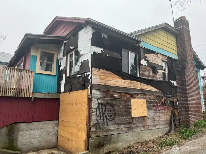East Elevation and view of rear garage
