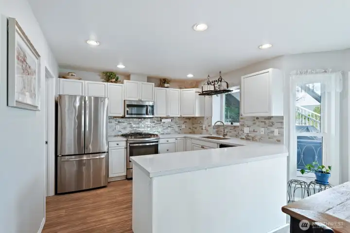 Newly updated kitchen with Quartz counters.