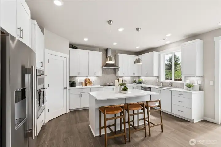 Modern kitchens with white soft close cabinetry and stainless-steel KitchenAid appliances (refrigerator is upgrade option)