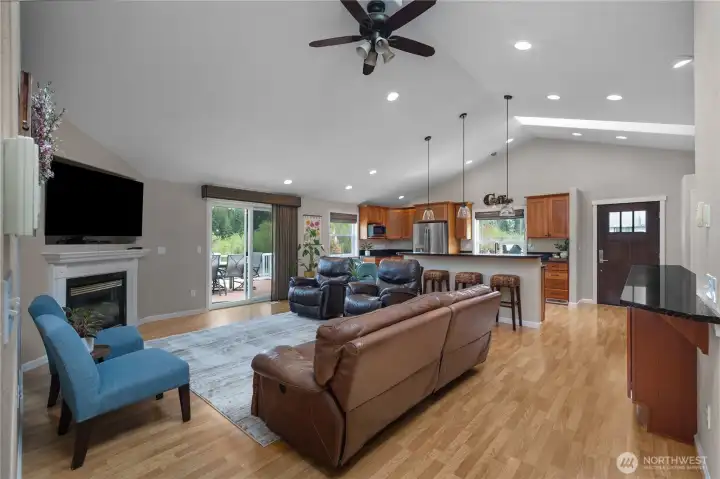 Open concept living area with fireplace