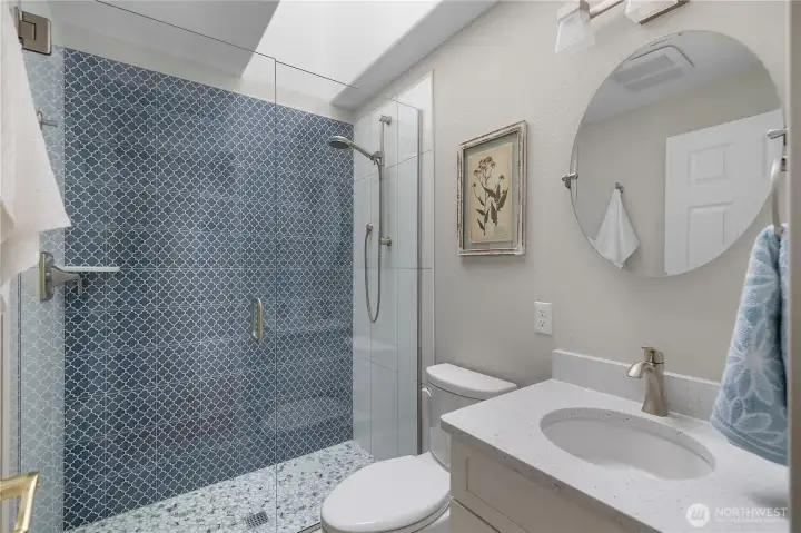 Updated guest bathroom with walk in shower on main level