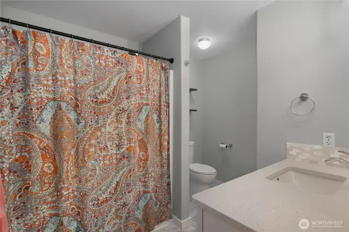Downstairs bathroom with tub