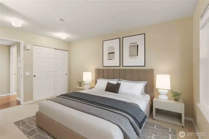 Virtually staged primary bed.