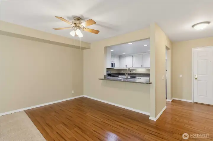 Nice sized dining room with bar seating open to kitchen for ease of entertaining.