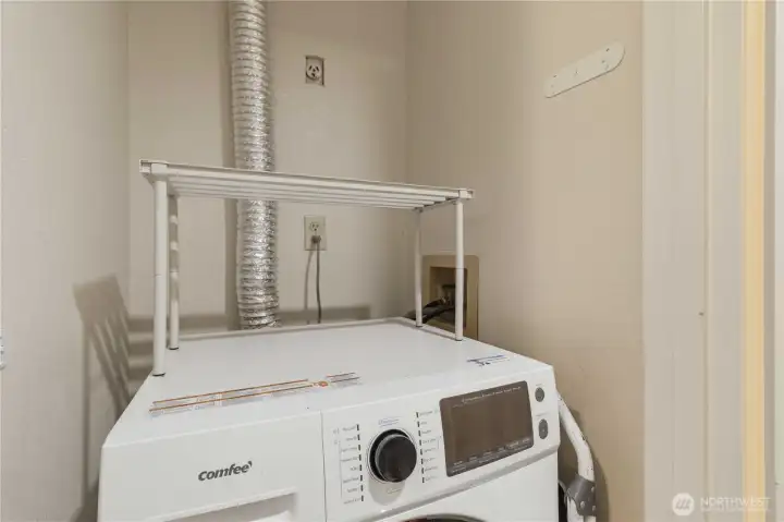 Space saving washer and dryer unit.
