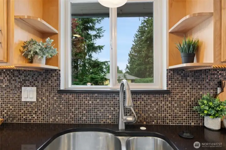 Kitchen with views out to private backyard Kitchen with views out to private backyard
