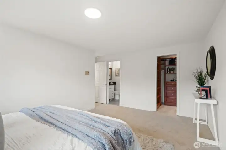Primary Bedroom with walk in closet and en-suite bathroom with shower. Fresh paint, lighting and carpets. Primary Bedroom with walk in closet and en-suite bathroom with shower. Fresh paint, lighting and carpets.
