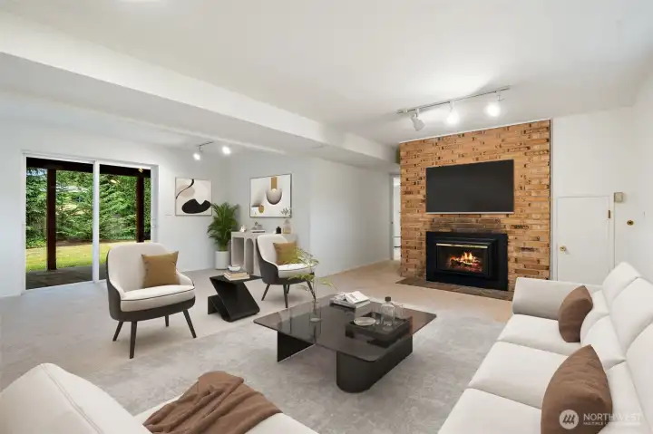 Family room on lower level - level in from backyard and garage. Fireplace, fresh carpets & paint. Virtually staged to show potential! Family room on lower level - level in from backyard and garage. Fireplace, fresh carpets & paint. Virtually staged to show potential!