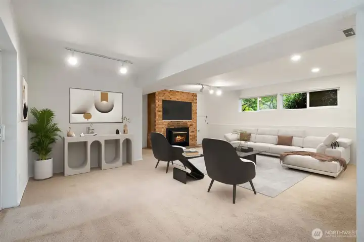 Family room on lower level - level in from backyard and garage. Fireplace, fresh carpets & paint. Virtually staged to show potential! Family room on lower level - level in from backyard and garage. Fireplace, fresh carpets & paint. Virtually staged to show potential!