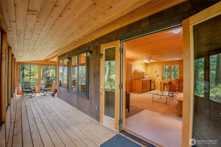 Screened deck with French doors to the living room.