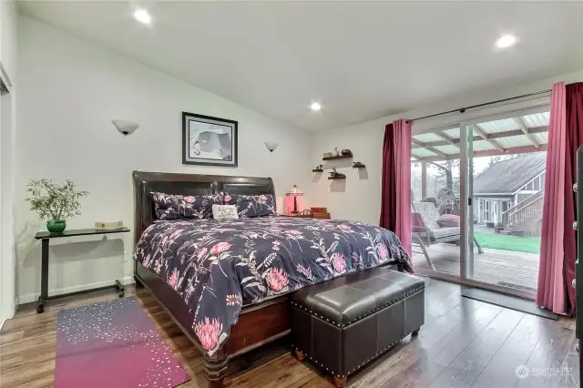 Main house bedroom #3 with patio doors and new covered deck!