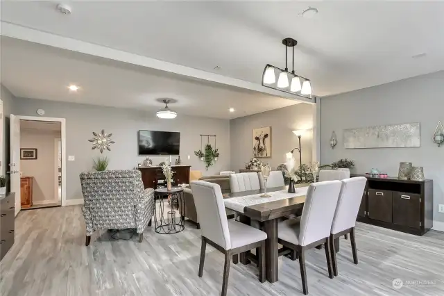 View of dining and living areas from the guest house entry, open concept and straight ahead is an additional bonus area and bedroom.