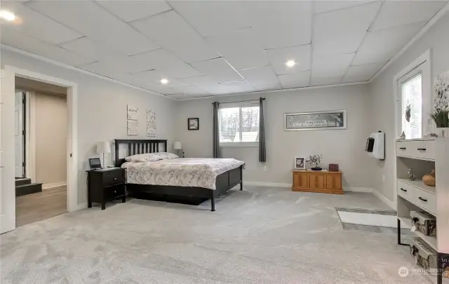 Guest house bedroom, so large! Door leading out and also an ensuite bath.