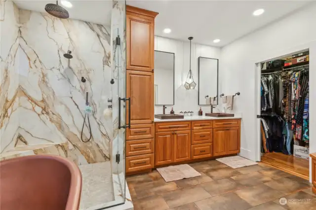 THIS IS IT! Custom Bathroom Remodel in 2024 with Slab porcelain & tile shower, new glass shower enclosure,  heated floors, double slipper foot copper tub, bidet toilet, new linen cabinet, bench with storage, dual copper sinks, quartz counters, new bath/sink fixtures, lighting, flooring, paint & new cabinet hardware!!