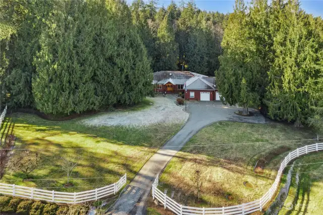 Replaced the wood split rail fence & gates in 2022 with a new vinyl split rail fencing & gates for $8K!