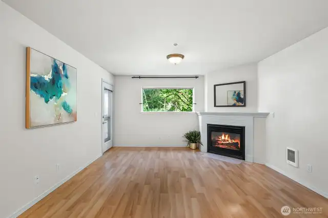 Great room with gas fireplace and access to back deck