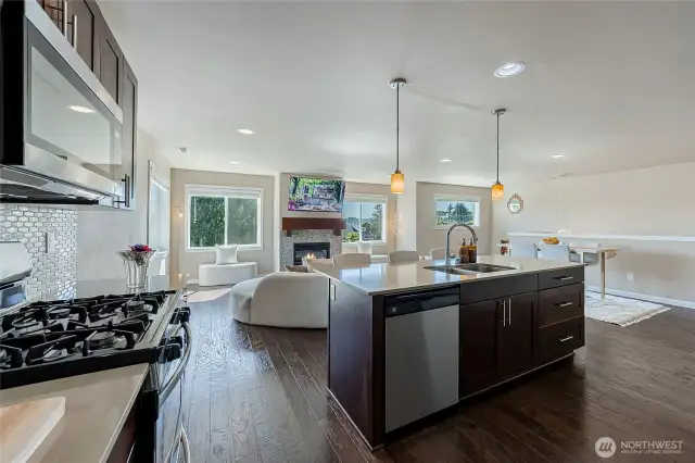 Stainless steel kitchen appliances. 4 burner gas range. Soft close, high quality custom cabinetry throughout the home.