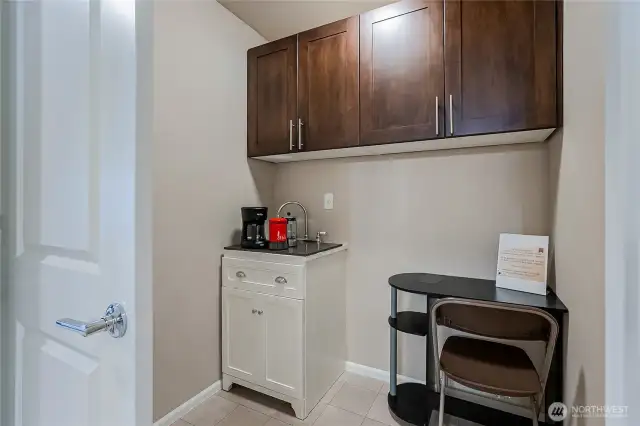 Multipurpose area with GFCIs, vent, and sink can be kitchenette, small office, laundry room, utility room etc. Add a divider and lower level can be a separate unit from upstairs. Stackable Laundry now in Garage. Can convert back easily to this room as needed too.