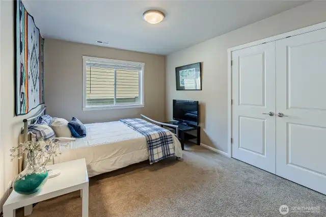 Good size entry level bedroom with peek-a-boo water view.
