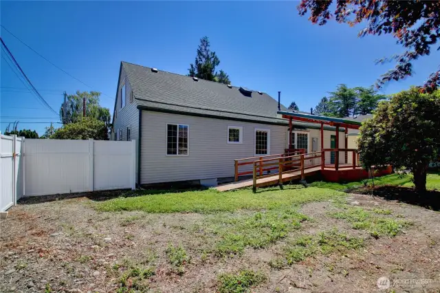 Covered back deck with wheelchair access.